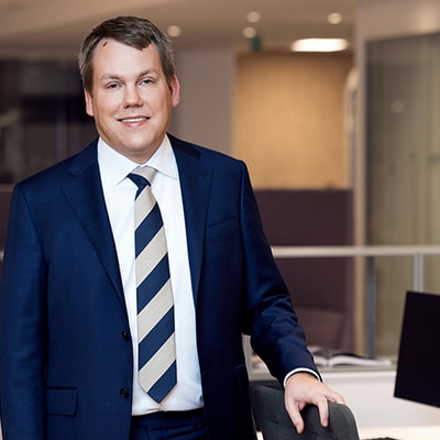 Stefan Widing standing in an office environment